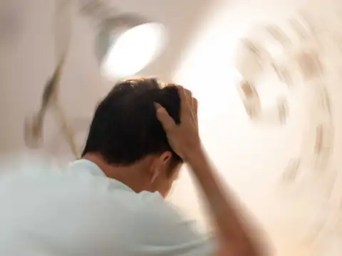 Symptom 5: Dizziness and balance Issues