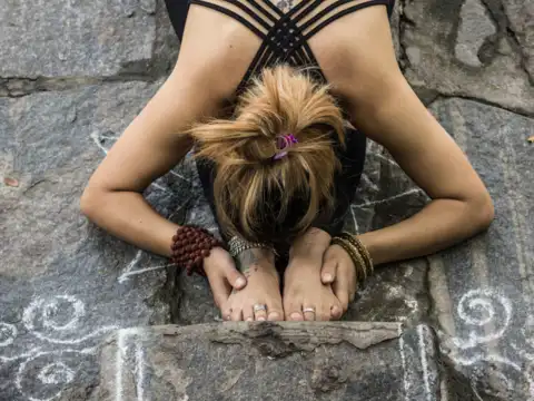 Seated forward bend (Paschimottanasana)