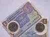 Rupee hits 2-week low; oil, shares weigh