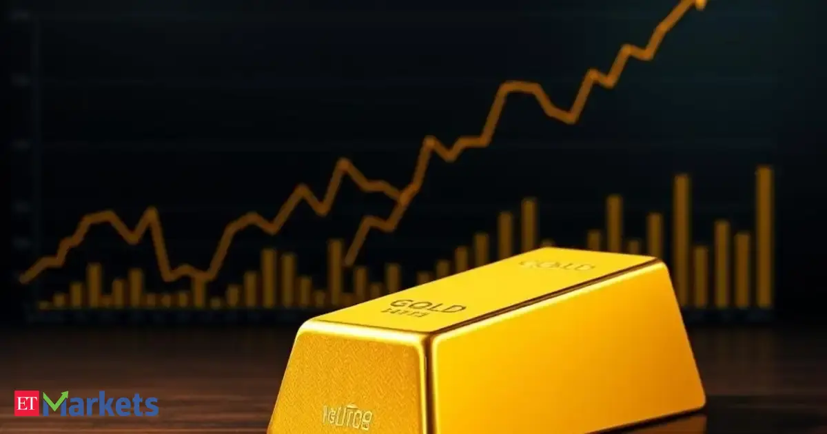 Gold holds firm near record high on US rate-cut expectations
