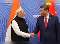Modi-Xi handshake, tax cuts boost case for lagging Indian stocks - The ...