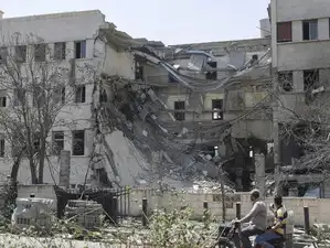 Israel strikes in vicinity of three Syrian cities, Syrian media say