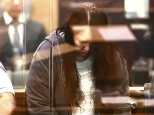 A New Zealand woman is convicted of murdering her 2 children and leaving their bodies in suitcases