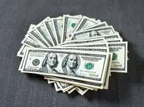 Dollar on defensive despite Powell's caution on further easing