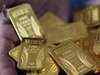 Gold trades at one-week high; dollar, oil eyed
