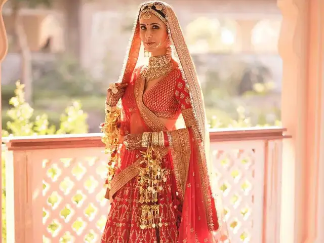 deepika padukone wedding dress red Deepika Padukone Wears a Deep Red Zuhair Murad Gown at Her Wedding  Reception And Makes For a Sexy Bride, See Pics