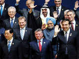 Manmohan Singh waves along with other leaders