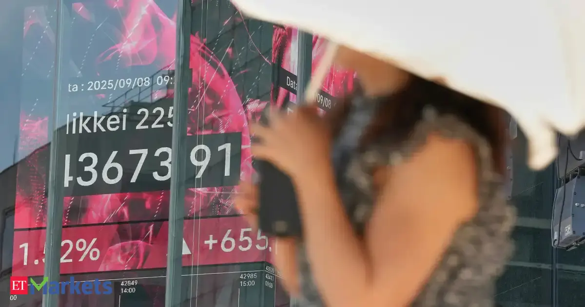 Japan's Nikkei hits record high as chip-related stocks track US peers