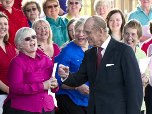 Prince Philip sharing a laugh with the women's choir