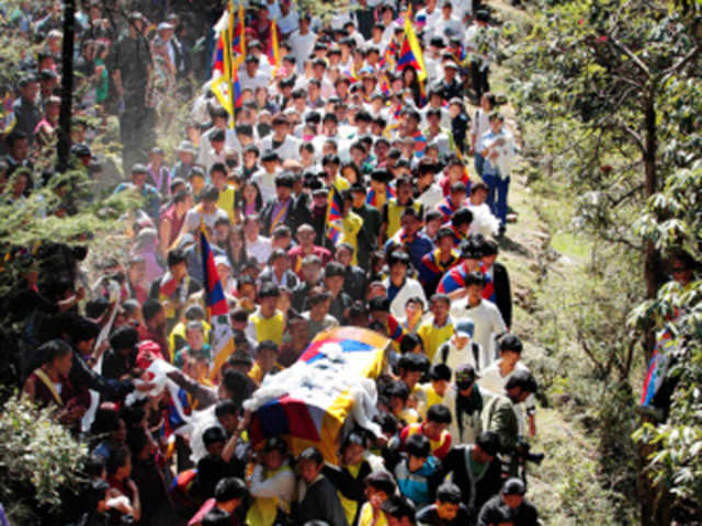 Tibetan exiles at a funeral procession