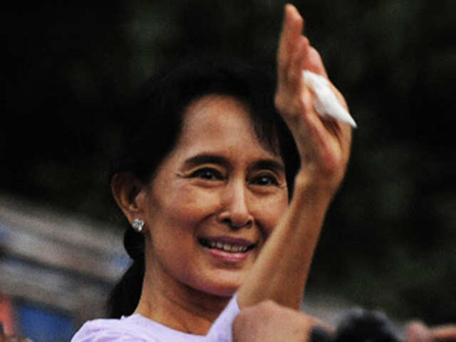 Myanmar's leader Suu Kyi waving to the supporters