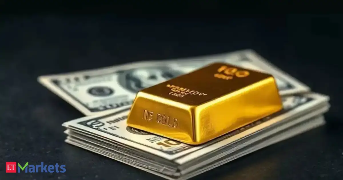 Gold ticks up on dollar retreat, Fed rate cut