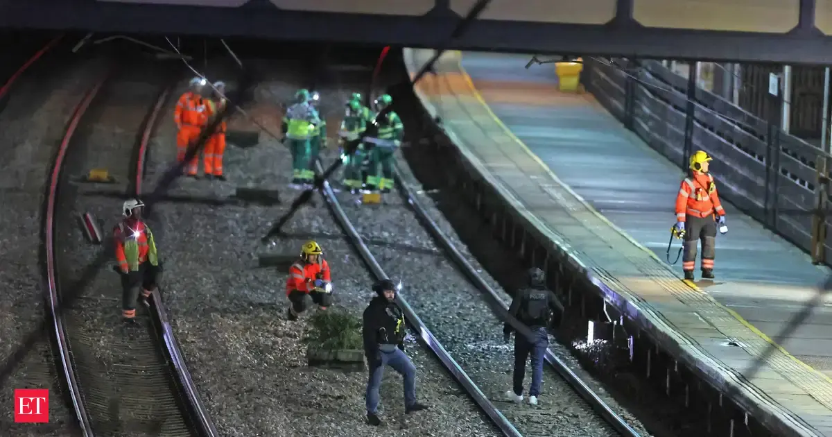 UK police say train knife attack not terrorist incident after two British men arrested