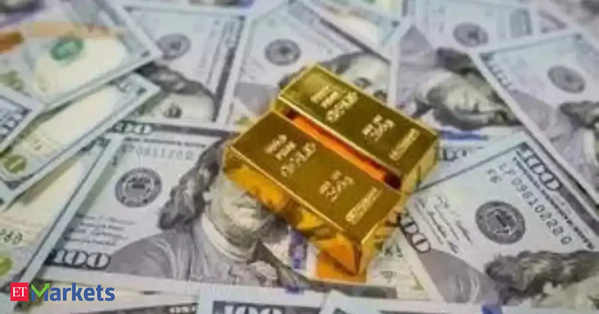 Gold dips as dollar firms on reduced rate-cut prospects