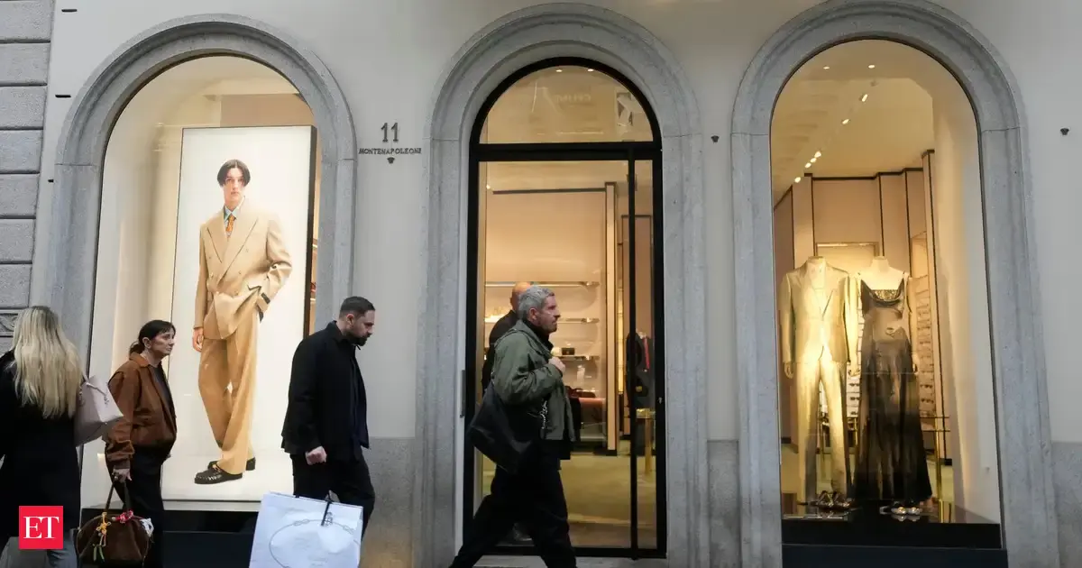 Prada completes Versace takeover