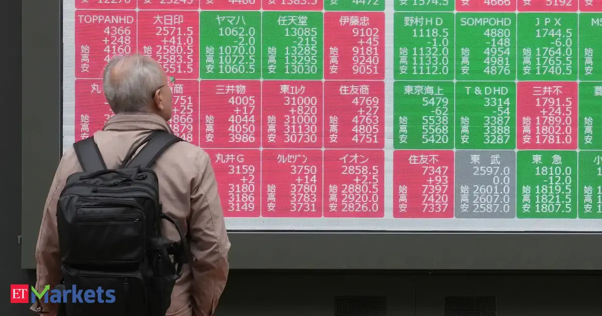 Japan's Nikkei buoyed by stable yen; SoftBank's slide caps gains