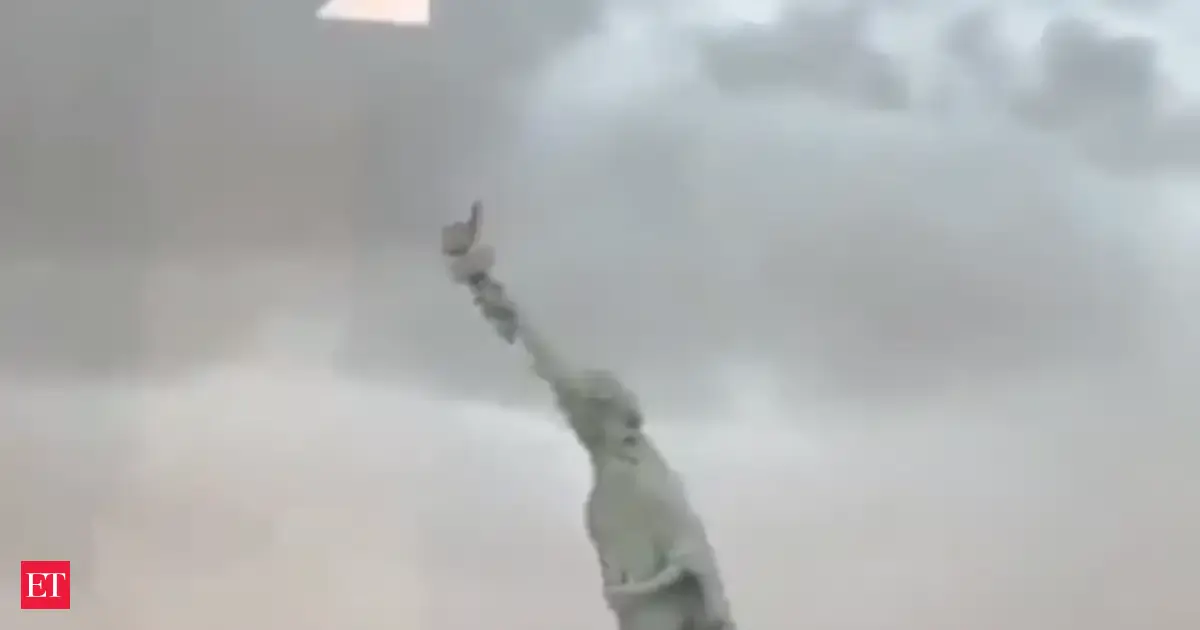 'Statue of Liberty' tilts, then topples to ground in Brazil's Rio Grande do Sul in dramatic video. Watch viral clip