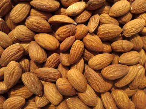 Almond Oil: Shine & Softness