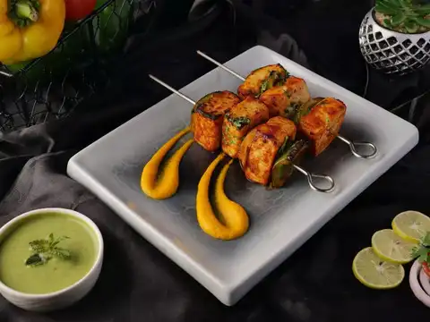 Paneer tikka with chilled raita and tandoori chicken sliders
