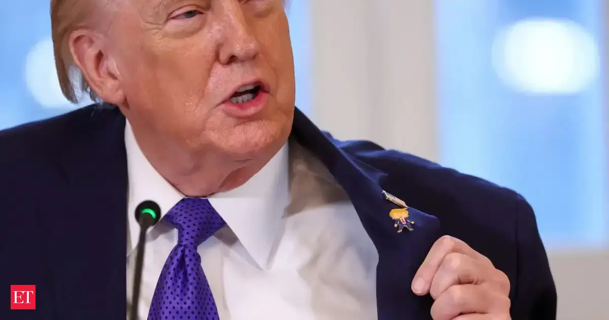 Trump shows off Happy Trump Pin at White House during Venezuela and Greenland talks