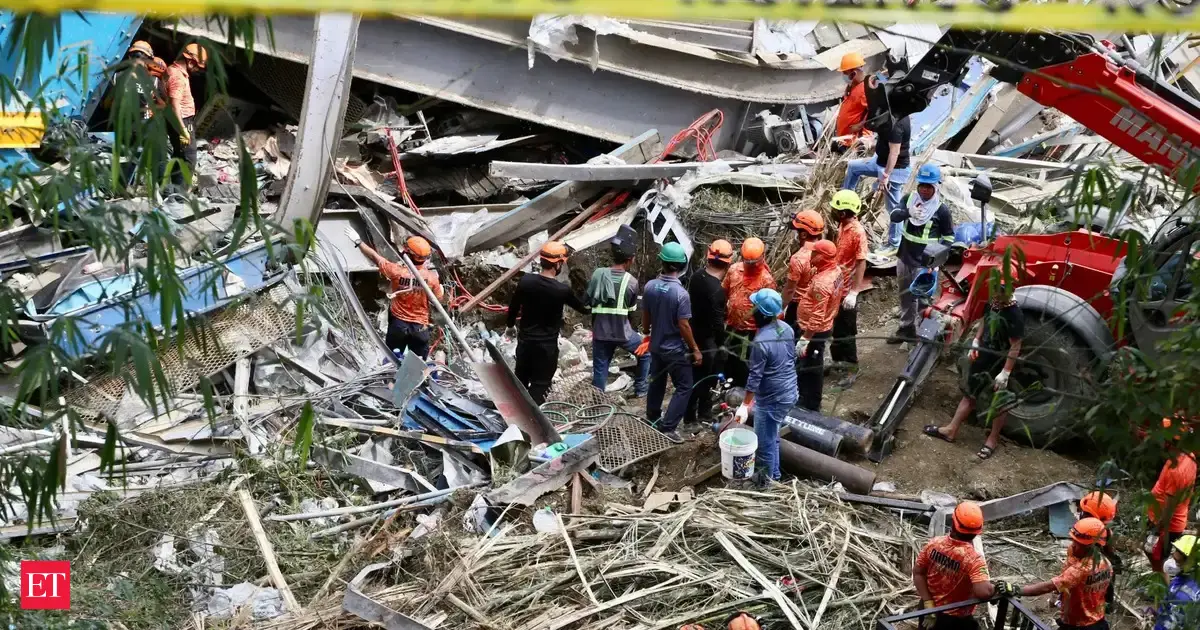 Six killed, 32 missing after 20-storey garbage heap collapses in Philippines; see pictures of the aftermath