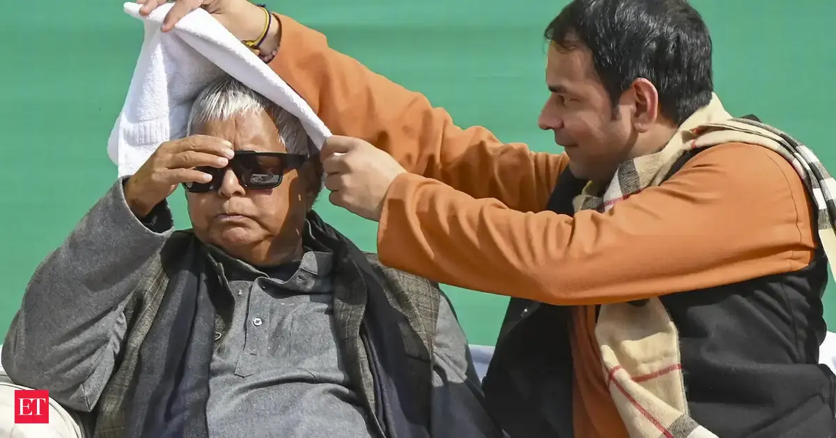 RJD president Lalu Prasad attends Tej Pratap's Sankranti feast, signals reconciliation after poll drubbing