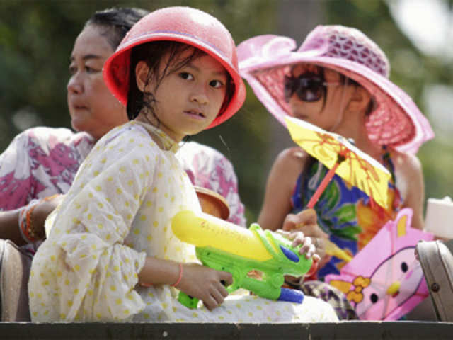 A girl takes part in Lao New Year celebrations