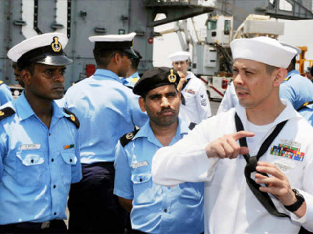 Indian and United States Navy sailors on board USS Carl Vinson