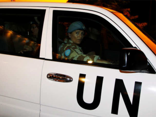Members of the first U.N. monitoring team in Syria