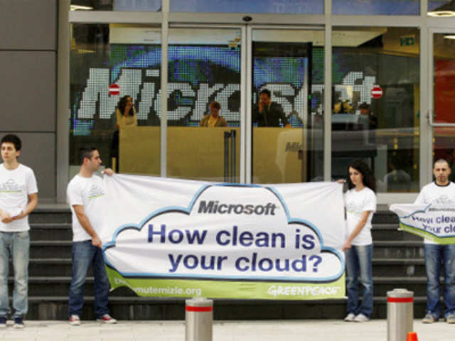 Greenpeace activists during a demonstration outside Microsoft's office