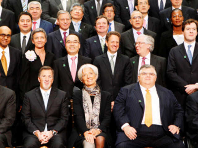 Finance ministers and central bank governors pose for a family photo