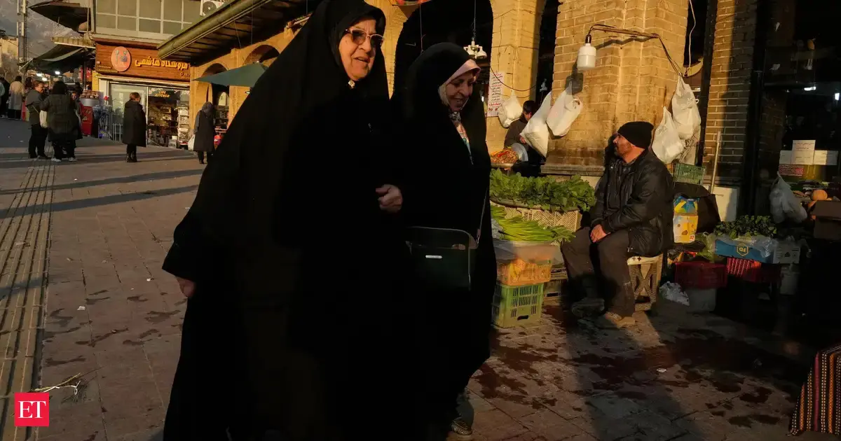 Iran's currency falls to a record low a month after protests began ...