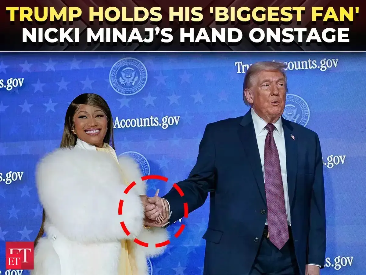 Nicki Minaj joins Trump onstage, holds his 'bruised' hand and makes $300,000 announcement for POTUS
