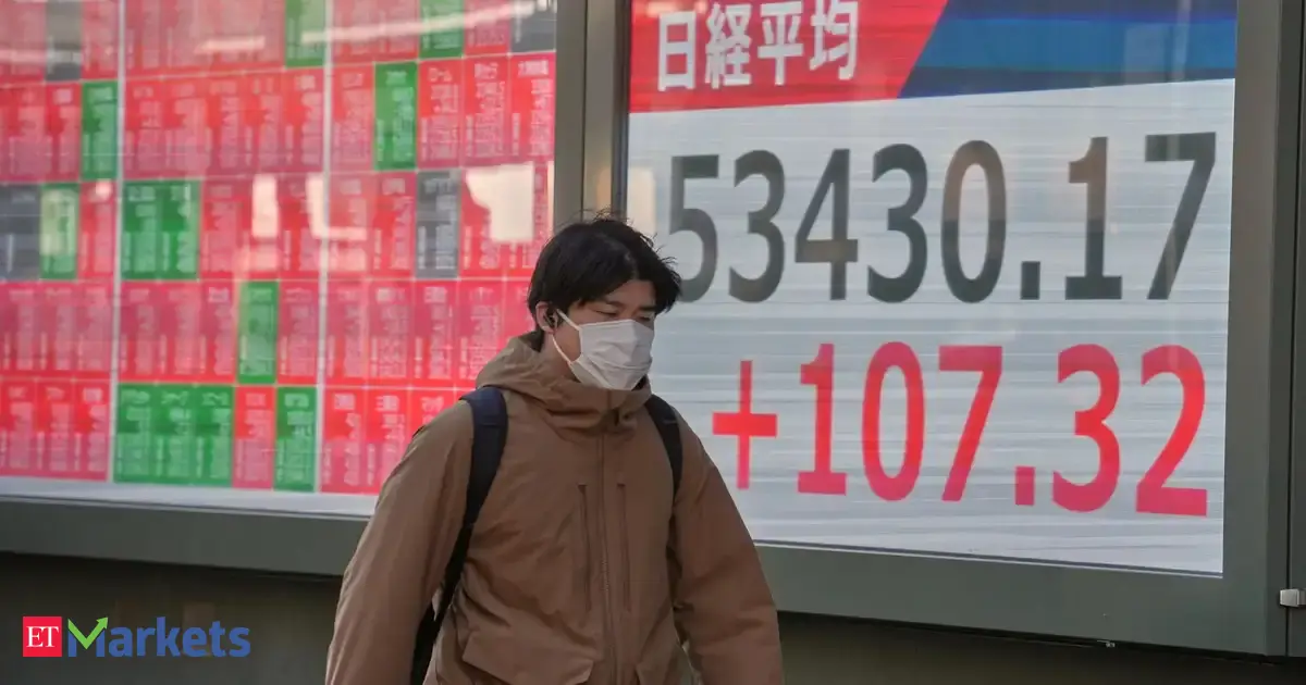 Japan's Nikkei rallies on earnings in unsteady trade before Sunday election