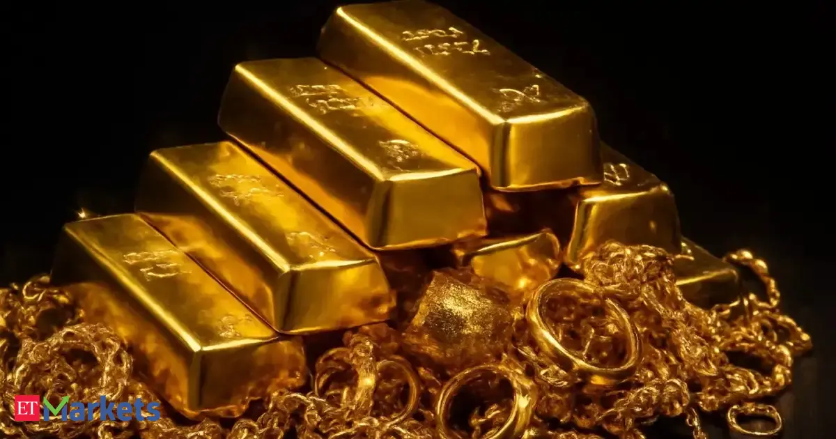 Gold prices dip on firmer U.S. dollar
