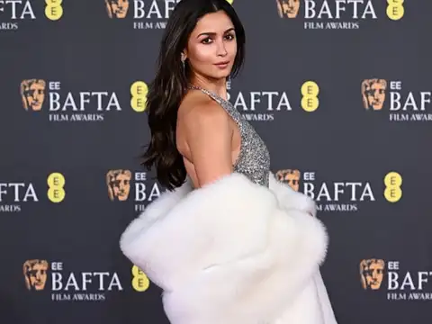 Custom silver Gucci gown by Demna