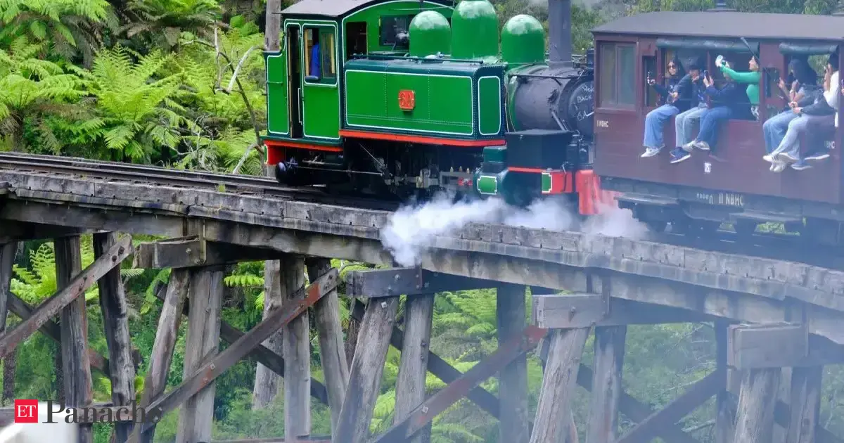 Passengers hang their legs out the window on a special Australian train. A journey that should be on every traveller’s bucket list.