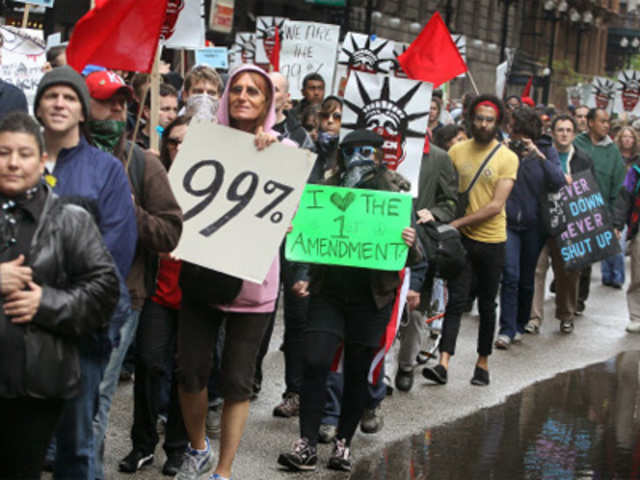 Demonstrators participate in a May Day march