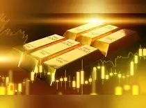 Gold rises off one-month low; firm dollar, hawkish Fed cap gains