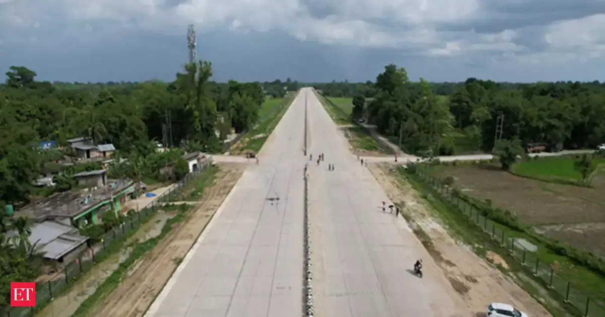 AI-enabled camera monitoring traffic and road conditions on a modern Indian national highway.