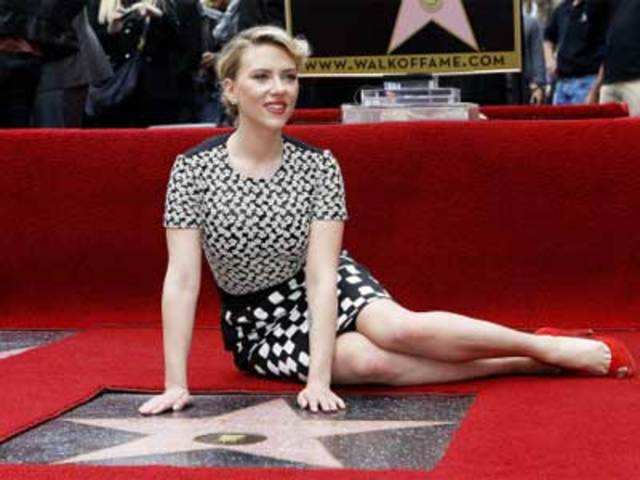 Actress Scarlett Johansson poses at the Walk of Fame in Hollywood