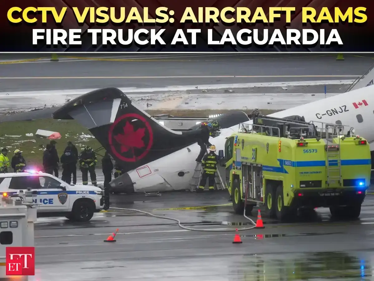 LaGuardia airport crash: CCTV footage shows Air Canada Express jet colliding with fire truck