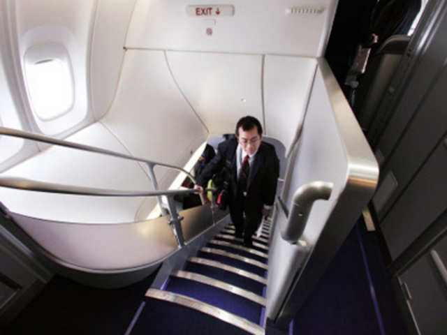 Visitor walks up to second floor on the new Boeing 747-8 Intercontinental 