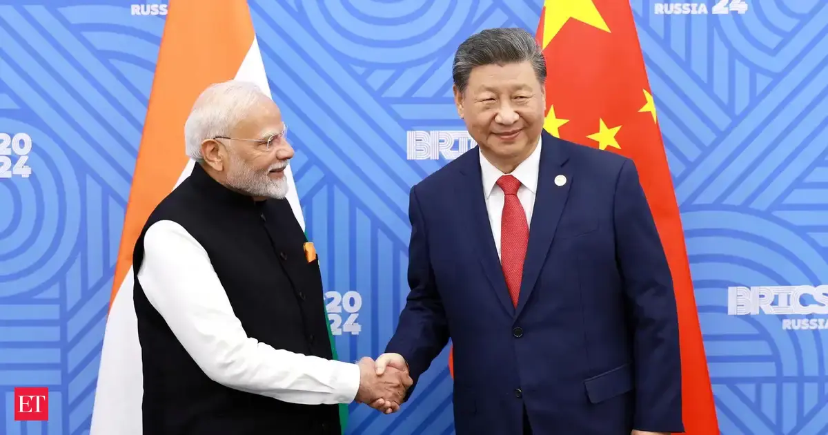 China courts India while taking a dig at US