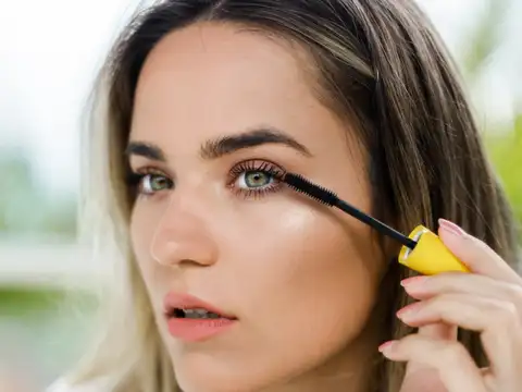 Apply mascara to enhance eyes