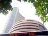 Markets close in red; Sensex down 323 points