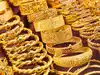 Govt imposes import curbs on all articles of gold, silver, platinum