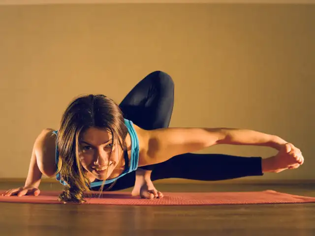 Struggling with stiffness and weak strength? This yoga pose builds both ...