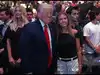 Trump takes the spotlight at UFC 327 in Miami, greeting Rogan and Rubio