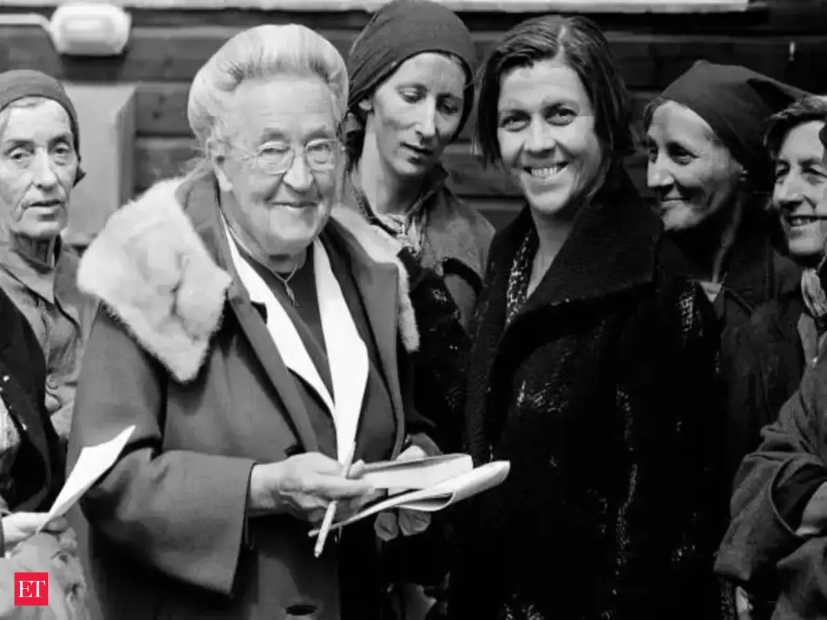 Quote of the day by Corrie Ten Boom: ‘When a train goes through a tunnel and it gets dark, you don’t...’ a message of courage, hope and having faith in the darkest hours